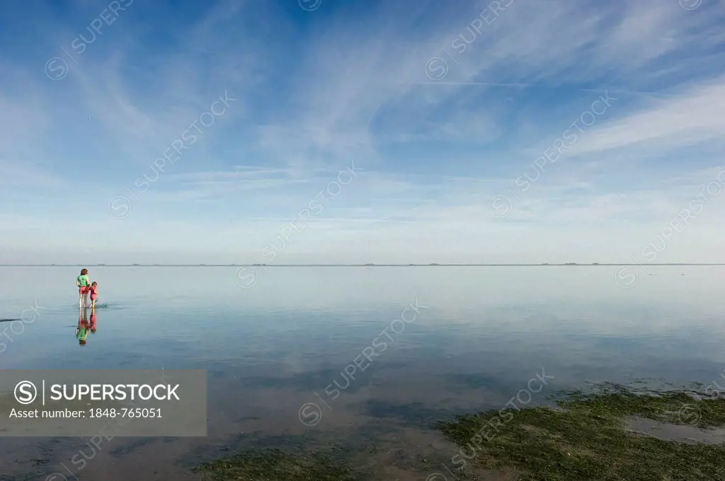 Mother and child in the Wadden Sea near Wyk, Foehr Island, North Frisian Islands, Schleswig-Holstein, Germany, Europe