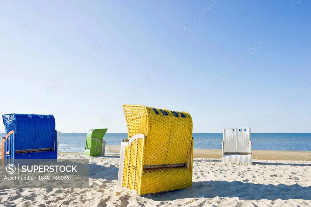 Coloruful beach chairs on the beach near Wyk, Foehr Island, North Frisian Islands, Schleswig-Holstein, Germany, Europe