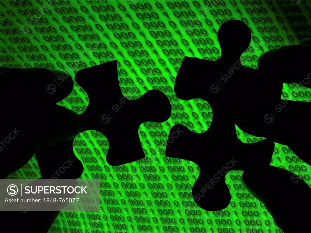 Two hands joining puzzle pieces, matrix
