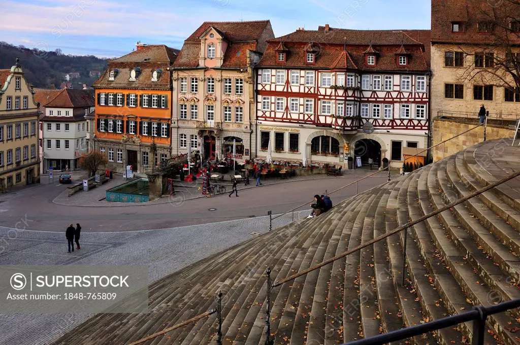 View from the flight of stairs in front of Saint Michael towards the old building facades on Marktplatz square, Schwaebisch Hall, Baden-Wuerttemberg, ...