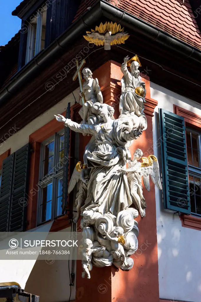 Statue of holy figures on a corner house in Bamberg