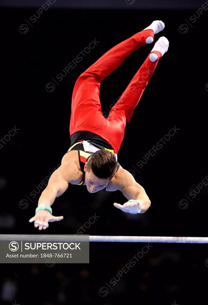 Marcel Nguyen, GER, performing on high bar, EnBW Gymnastics World Cup 2012, Men, Porsche-Arena
