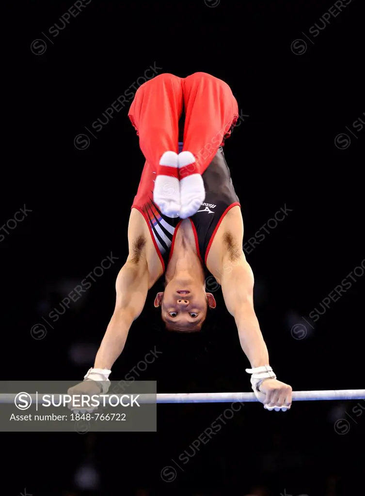 Kazuhito Tanaka, JPN, performing on the high bar, EnBW Gymnastics World Cup, 2012, Men, Porsche-Arena