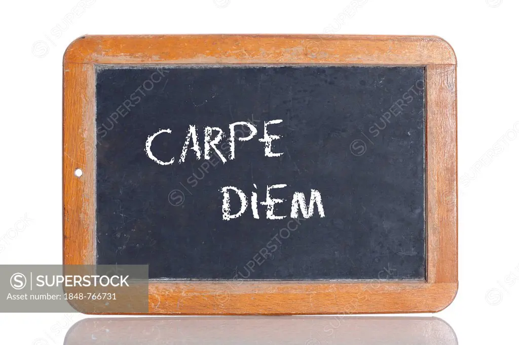 Old school blackboard with the phrase CARPE DIEM, Latin for Seize the day