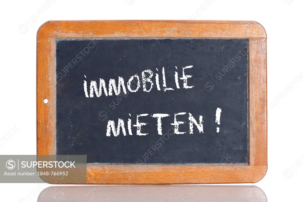 Old chalkboard, lettering IMMOBILIE MIETEN, German for RENT A PROPERTY