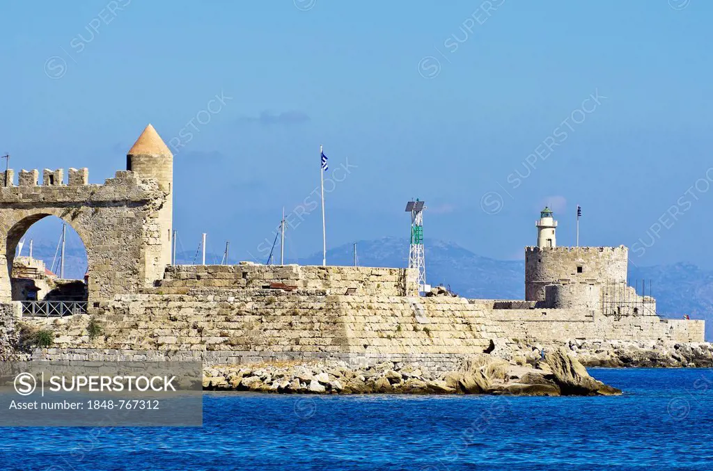 Harbour entrance of Rhodes in front of ramparts or defensive walls