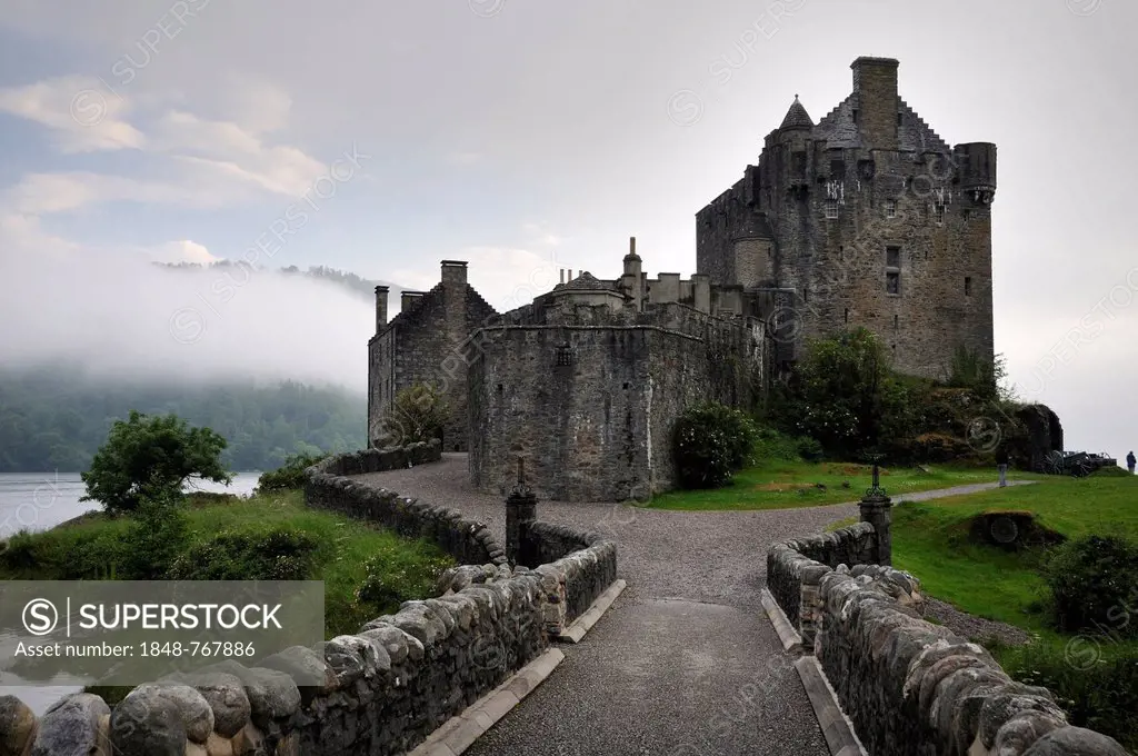 Eilean Donan Castle in the fog after rain