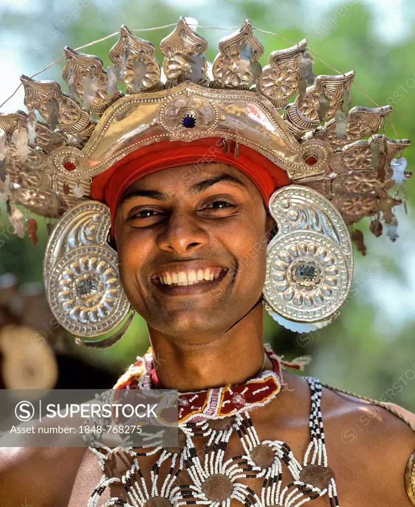 Kandyan dancer in traditional costume, headdress, silver, portrait