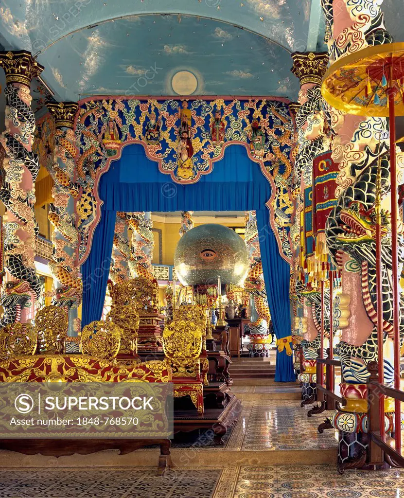 The Divine Eye in the Cao Dai Temple, during a mass with worshippers, Caodaiism