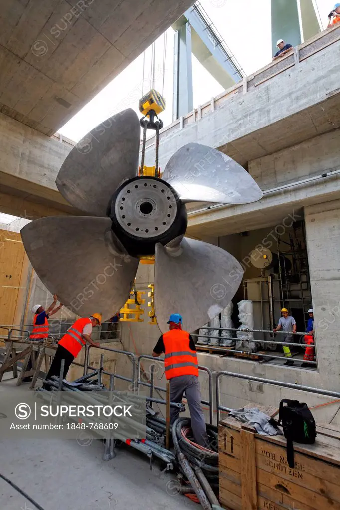 Construction site of the new hydropower plant in Rheinfelden, shaft 3, positioning the impeller, 6.5 metres in diameter and weighing 40 tons