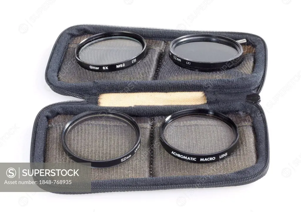 Case with different filters for a camera lens