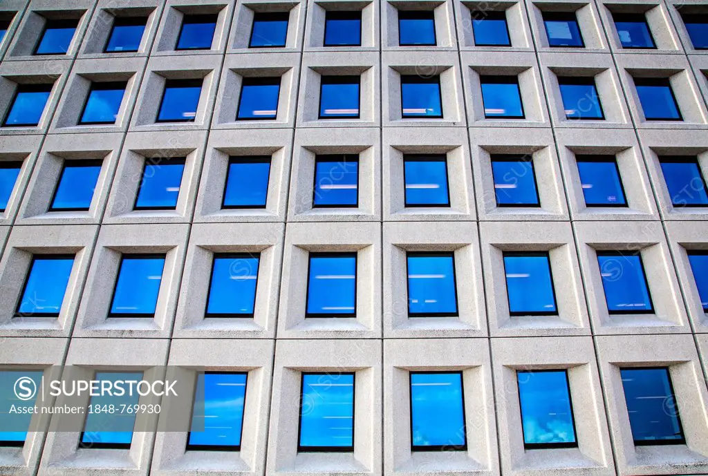 Concrete facade and windows of an office building