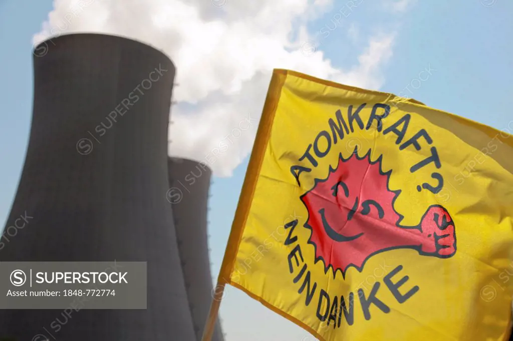 Cloth banner Atomkraft Nein danke, German for Nuclear power No thanks, flying in front of the cooling towers of Grohnde nuclear power plant, on the ...