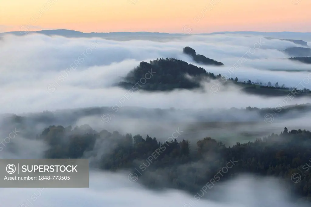 Zirkelstein Mountain and Kaiserkrone Mountain in the morning mist
