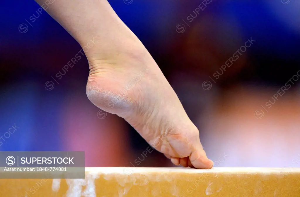 Detail view of a foot, balance beam, EnBW Gymnastics World Cup 2012, Porsche-Arena