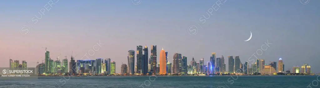 Panoramic view of the Doha skyline at dusk