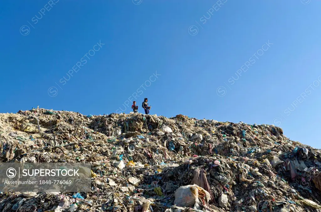 Children live, play and work on the garbage dump at Aletar garbage dump