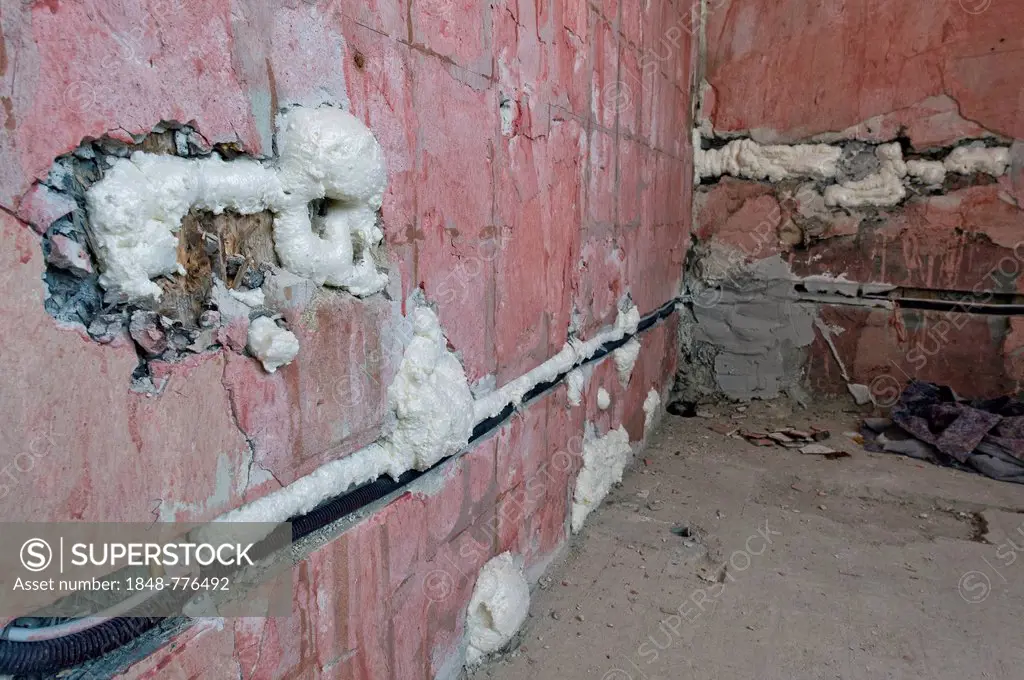 Cable channels, wall cavities filled with foam insulation, renovation of an old building, Stuttgart, Baden-Wuerttemberg, Germany, Europe