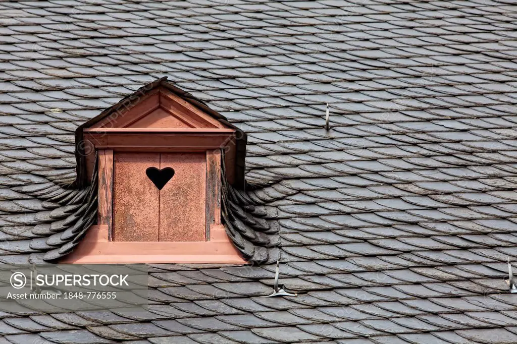 Dormer in a slate roof, shutters with heart, Germany, Europe