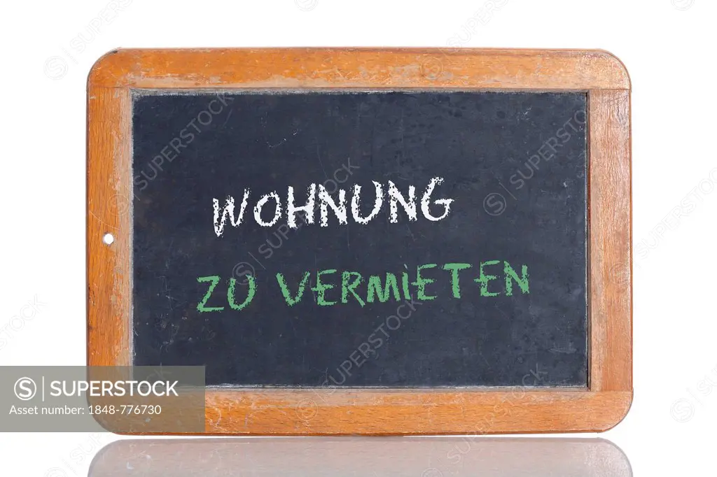 Old school blackboard with the words WOHNUNG ZU VERMIETEN, German for Apartment for rent