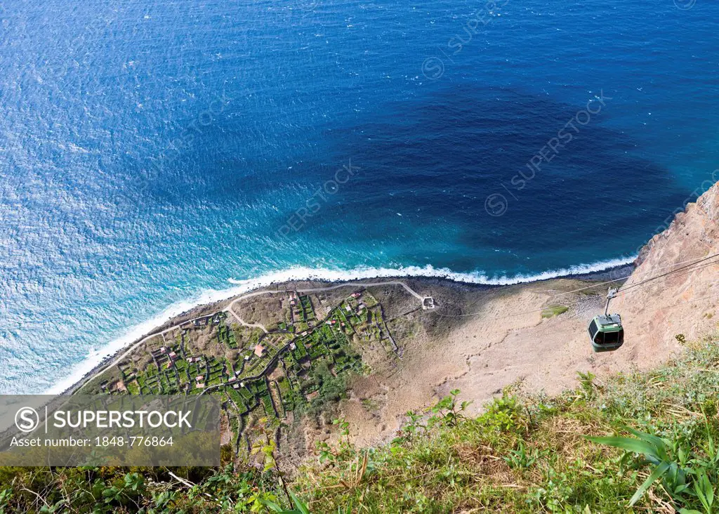 Cable car on the cliff coast of Santa Maria Madalena, at the foot of Cabo Girao mountain near Achadas da Cruz