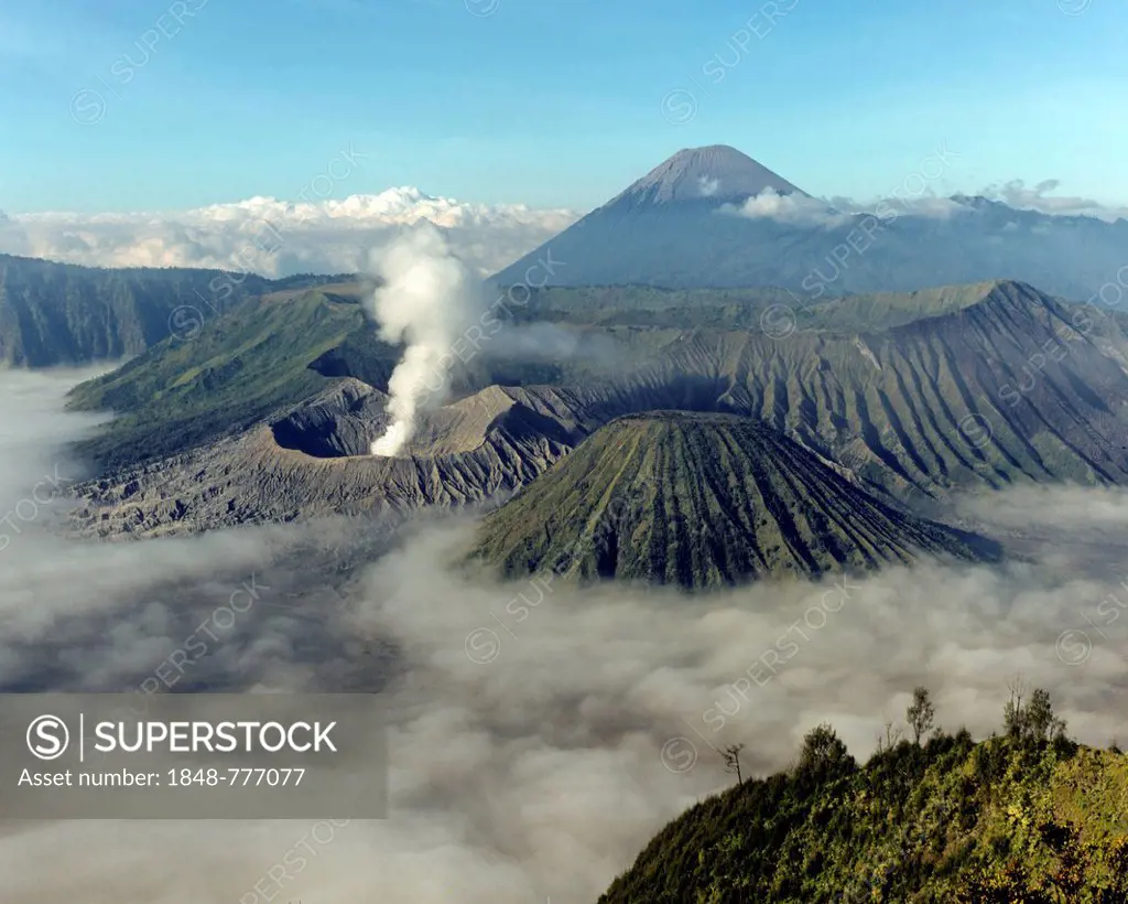 Mount Bromo with smoke, Mount Batok at front, Mt Kursi and Mt Gunung Semeru at back, volcano, eruption, Bromo Tengger Semeru National Park