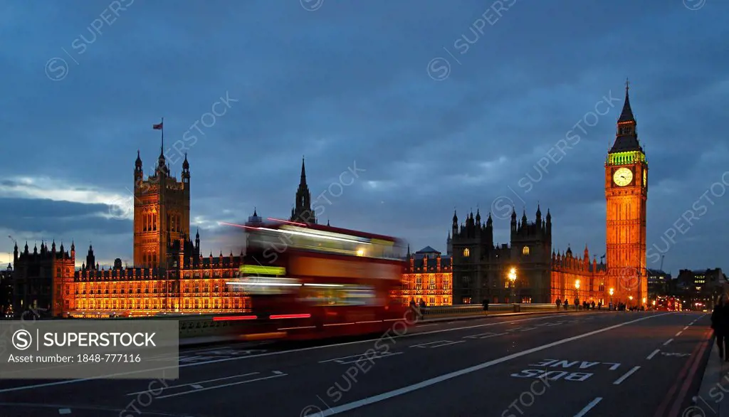 Westminster Bridge, Elizabeth Tower or Big Ben, Houses of Parliament, passing red double-decker bus in the evening