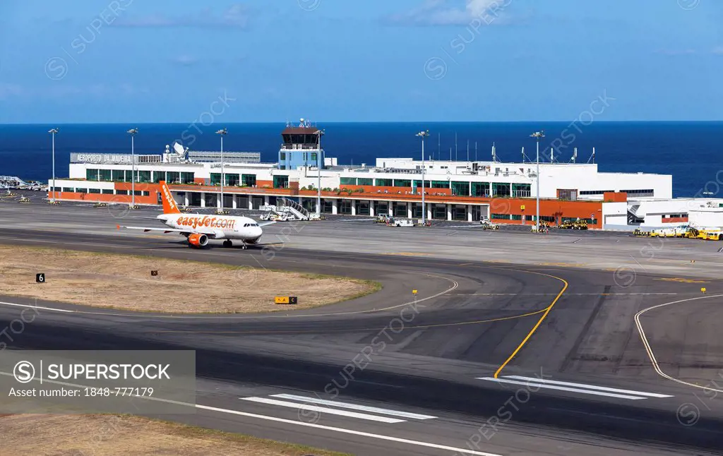 Airbus from easyjet.com in front of the terminal of Madeira Airport, LPMA, also known as Funchal Airport and Santa Catarina Airport