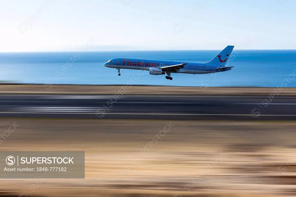 Boeing from Thomson TUI1 approaching the runway of Madeira Airport, LPMA, also known as Funchal Airport and Santa Catarina Airport