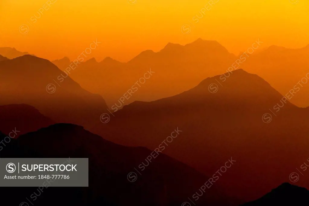 View from Faulhorn Mountain, 2681m, towards the mountains of the Bernese Alps at sunset