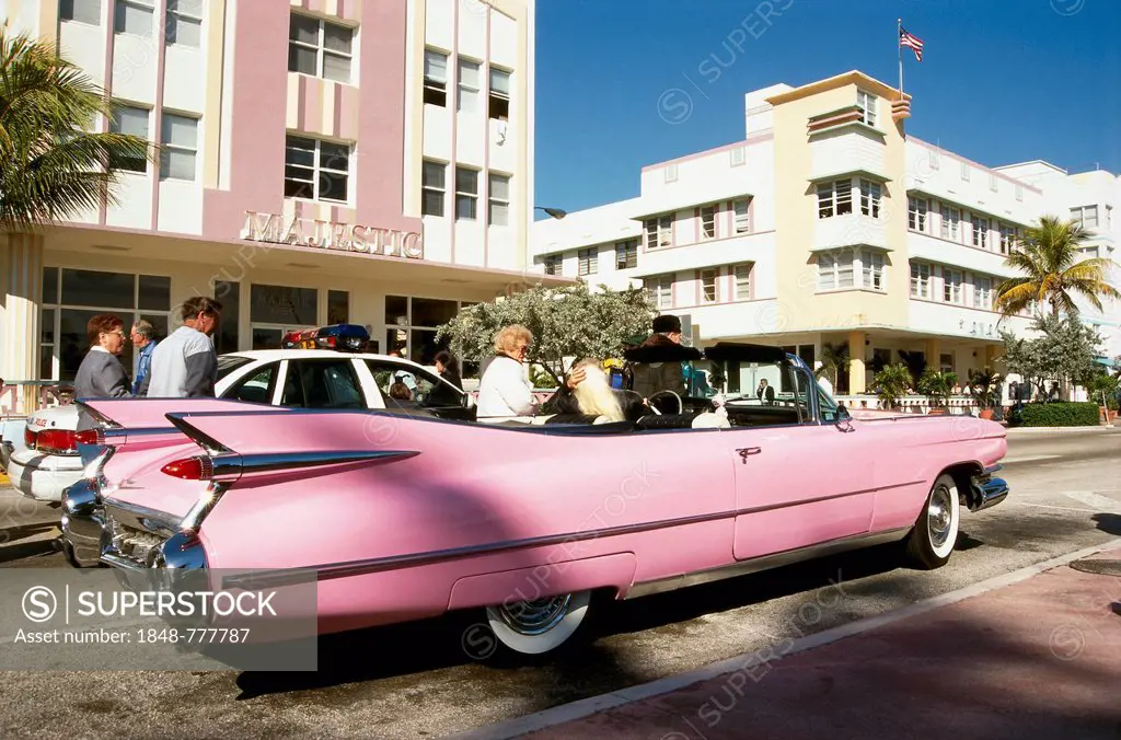 Pink Cadillac convertible parked on Ocean Drive