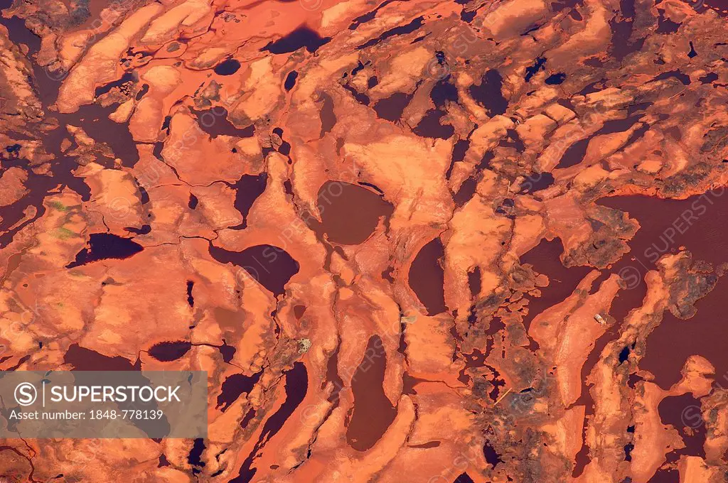 Aerial view, red mud or red sludge deposits