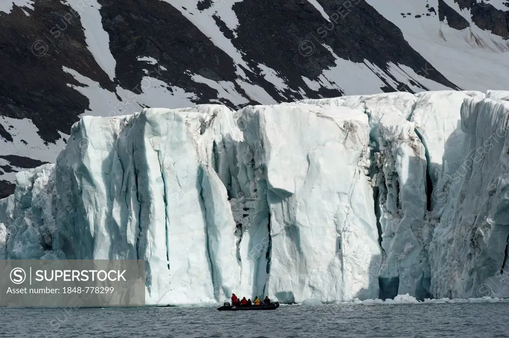 Zodiac inflatable boat during an expedition cruise in front of Samarinbreen Glacier