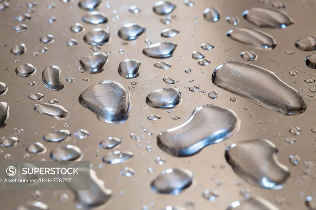 Water droplets on a metal surface