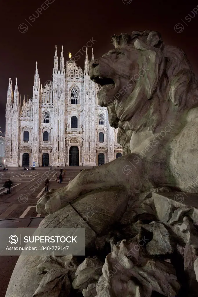 Lion sculpture on Piazza del Duomo, Cathedral Square, Milan Cathedral of Santa Maria Nascente in Milan