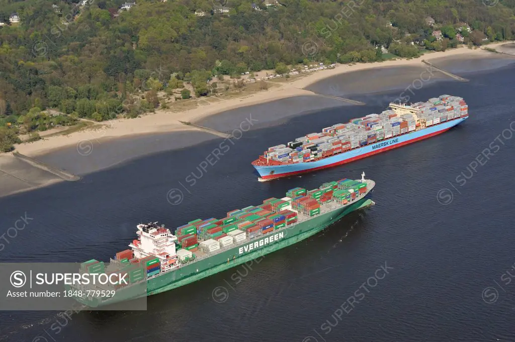 Container ships, Ever Conquest, front, and Charlotte Maersk, rear, on the Elbe River