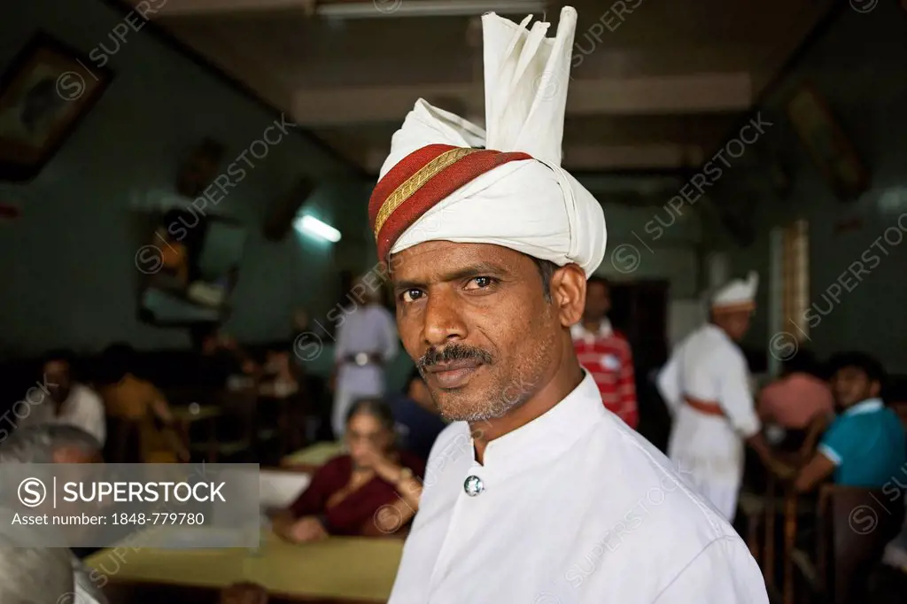 Indian coffee house, the waiters still wear uniforms from the British colonial period