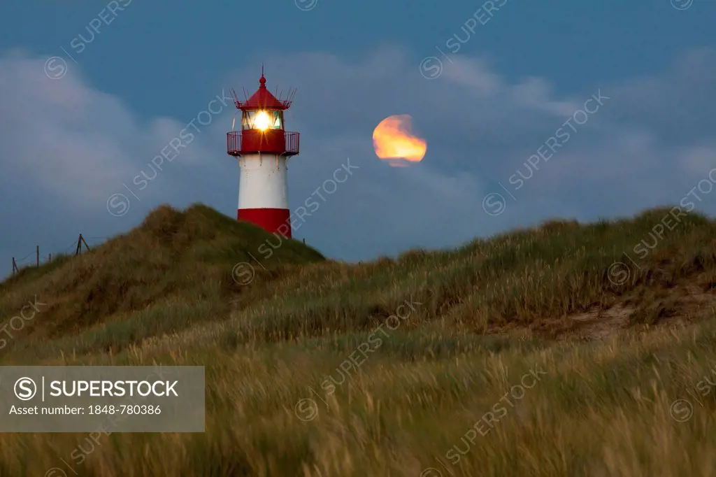 List Ost lighthouse at dusk with the full moon