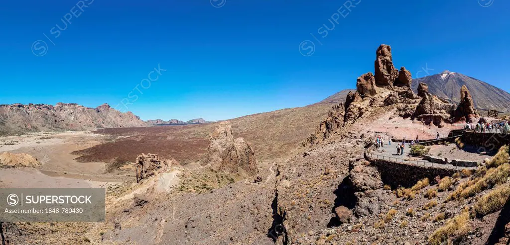 Lava rock in Teide National Park, Mount Teide volcano or Pico del Teide on the right, UNESCO World Natural Heritage Site
