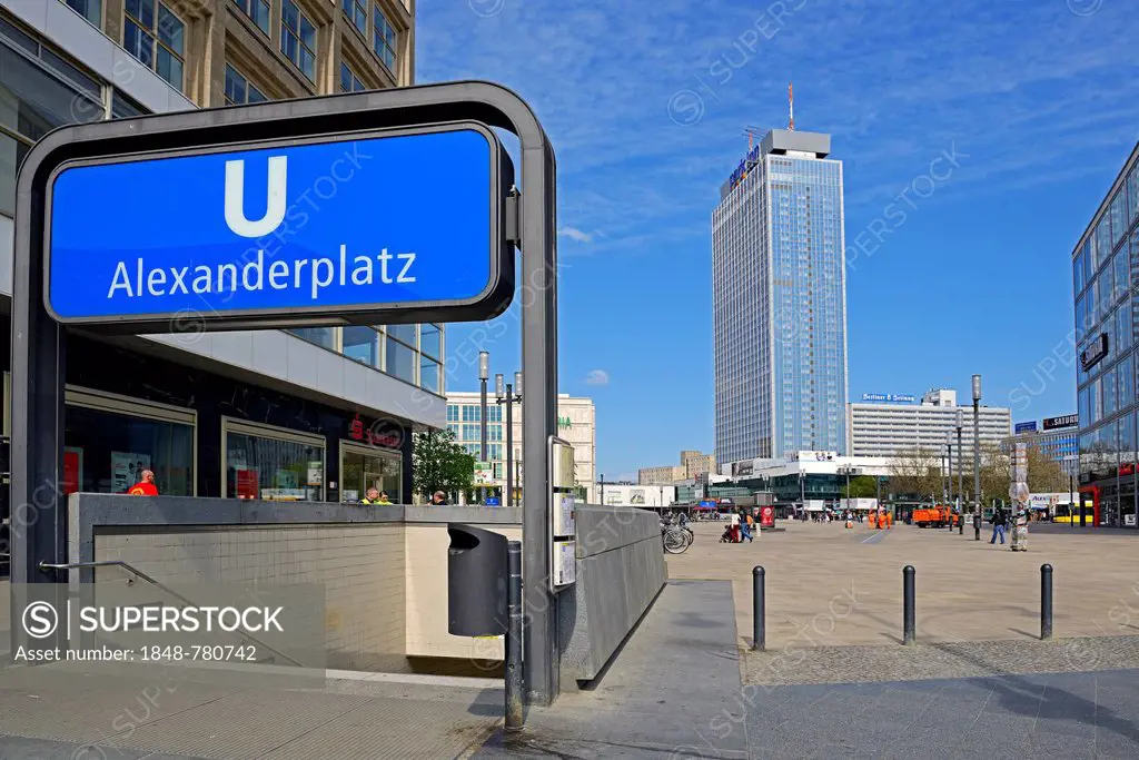 Subway entrance and the Park Inn Hotel at Alexanderplatz square