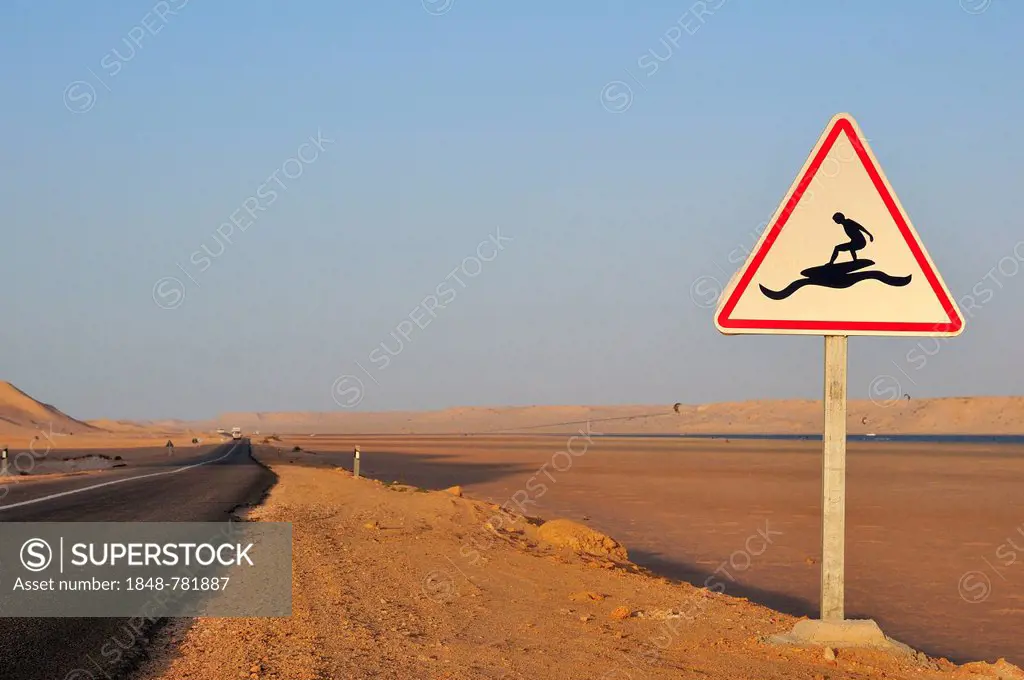 Road sign Caution Surfers at the Rio de Oro Bay