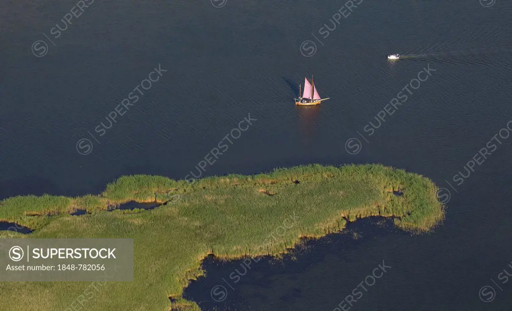 Aerial view, flat-bottomed boat and a sailing ship in Barther Bodden lagoon off Grosser Kirr Island