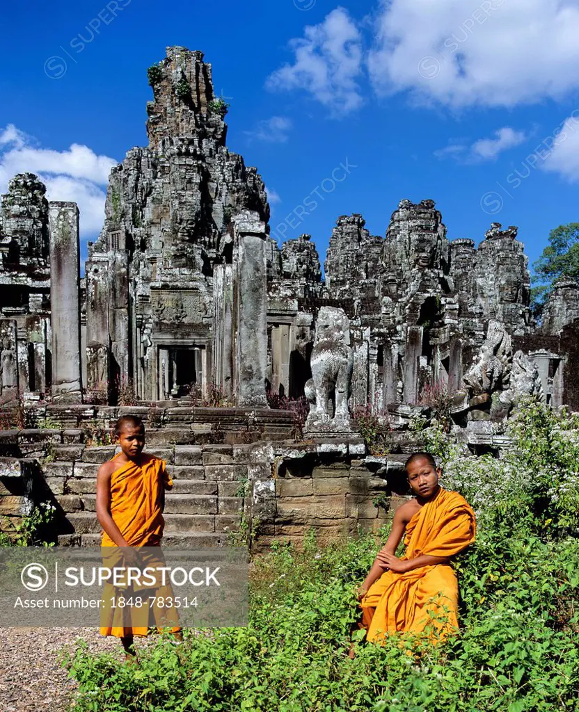 Bayon temple, monks, novices at the southern entrance, face towers