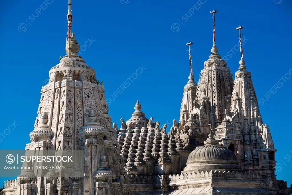 Domes and Shikhara towers at a temple complex on the holy mountain Shatrunjaya, important pilgrimage site for followers of Jainism, one of the four mo...