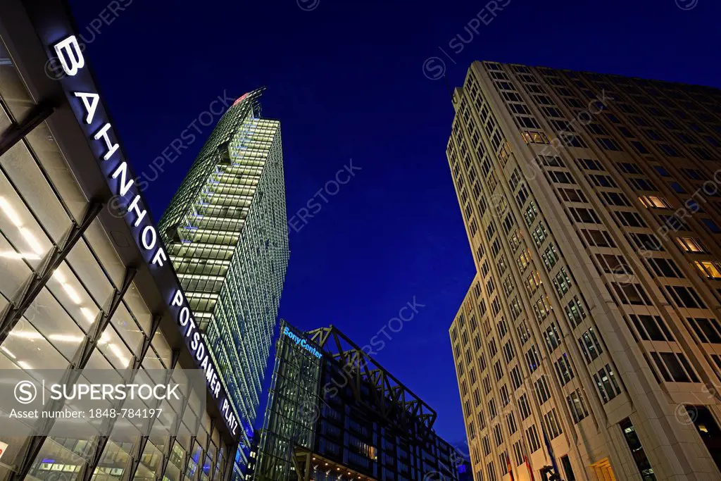 Entrance to the railway station with Bahnturm tower, left, and Beisheim Center with the Ritz Carlton Hotel, right, on Potsdamer Platz square, in the e...