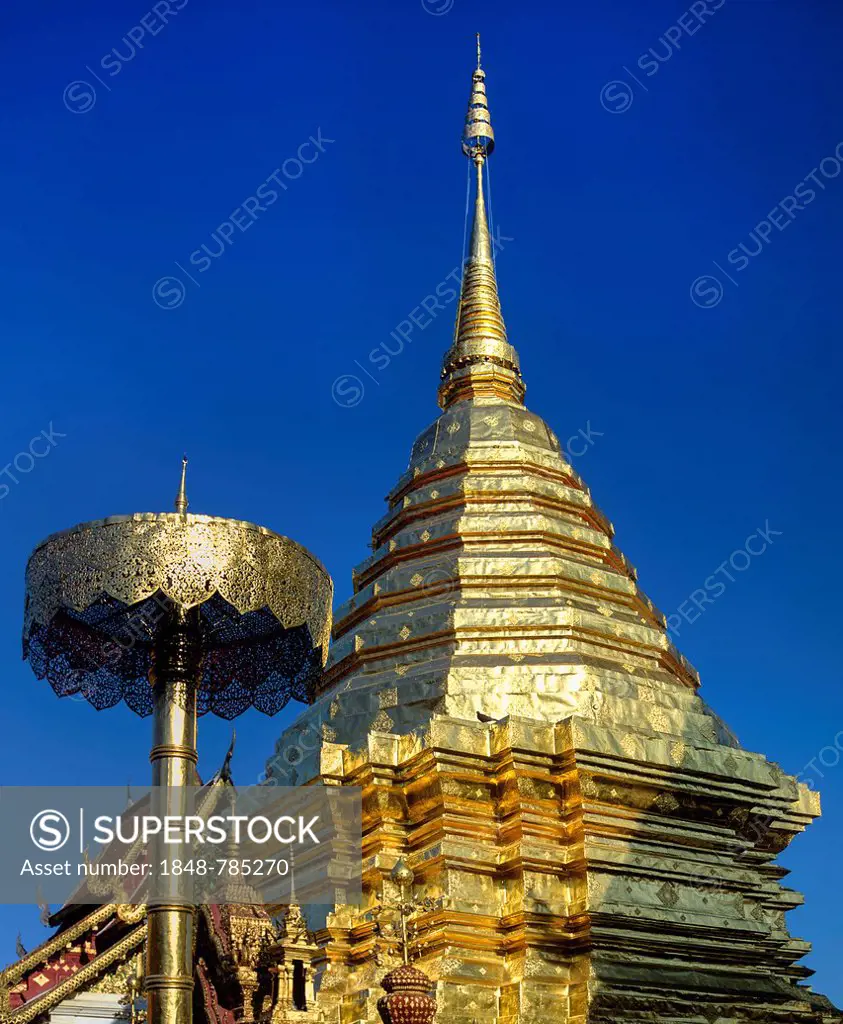 Wat Phra That Doi Suthep mountain temple with golden chedi with a golden umbrella