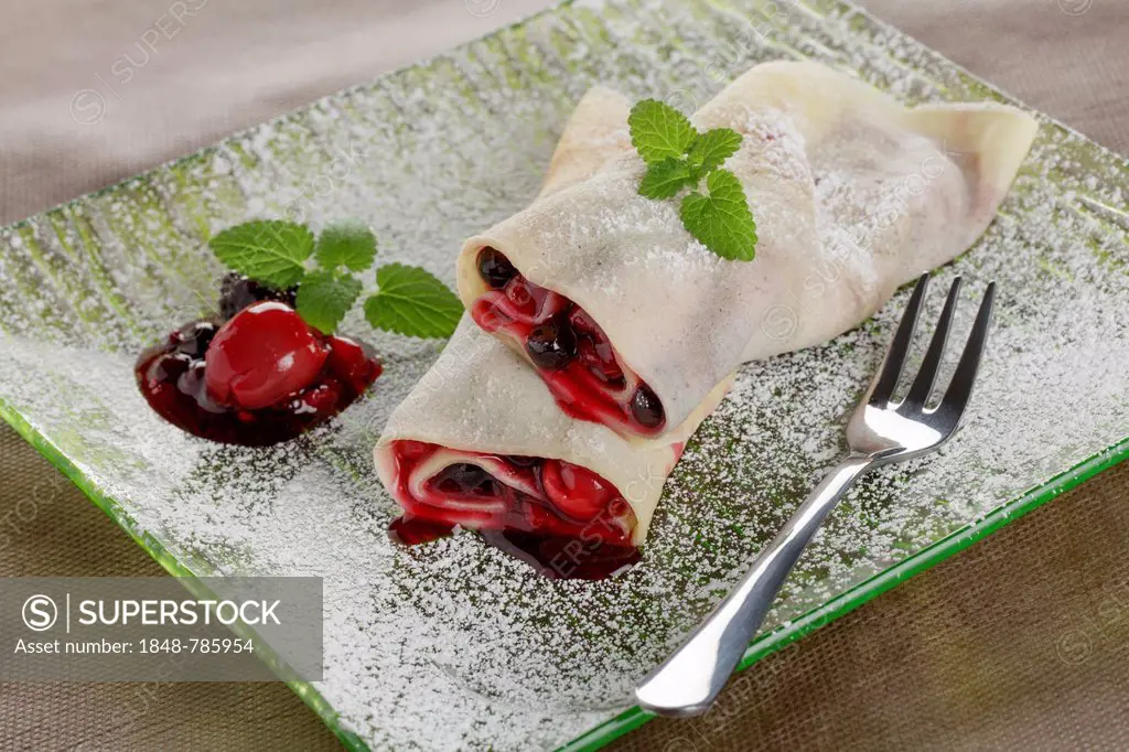 Crepe filled with Roter Grütze, a red fruit jelly