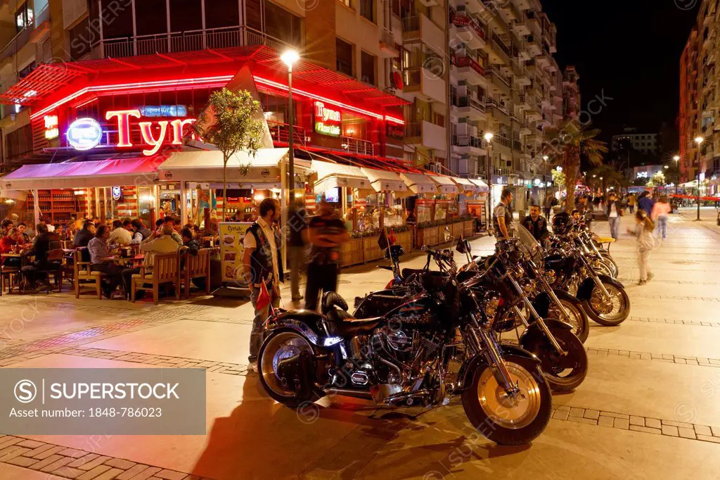Motorcycles in front of a restaurant