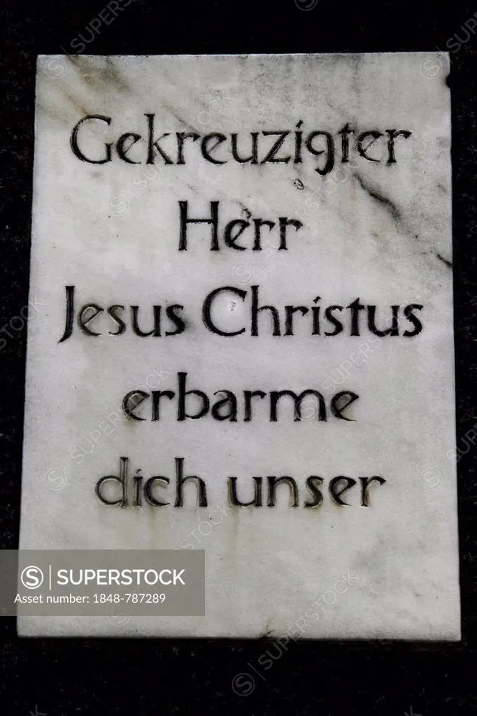 Inscription on the base of a wayside cross