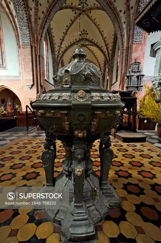 Renaissance baptismal font from 1592 in Guestrow Cathedral